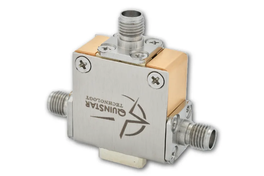 A QuinStar QCY cryogenic circulator for 4 to 8 GHz: a small metal box with a copper body and a steel cover, with three SMA connectors, one on each of three sides