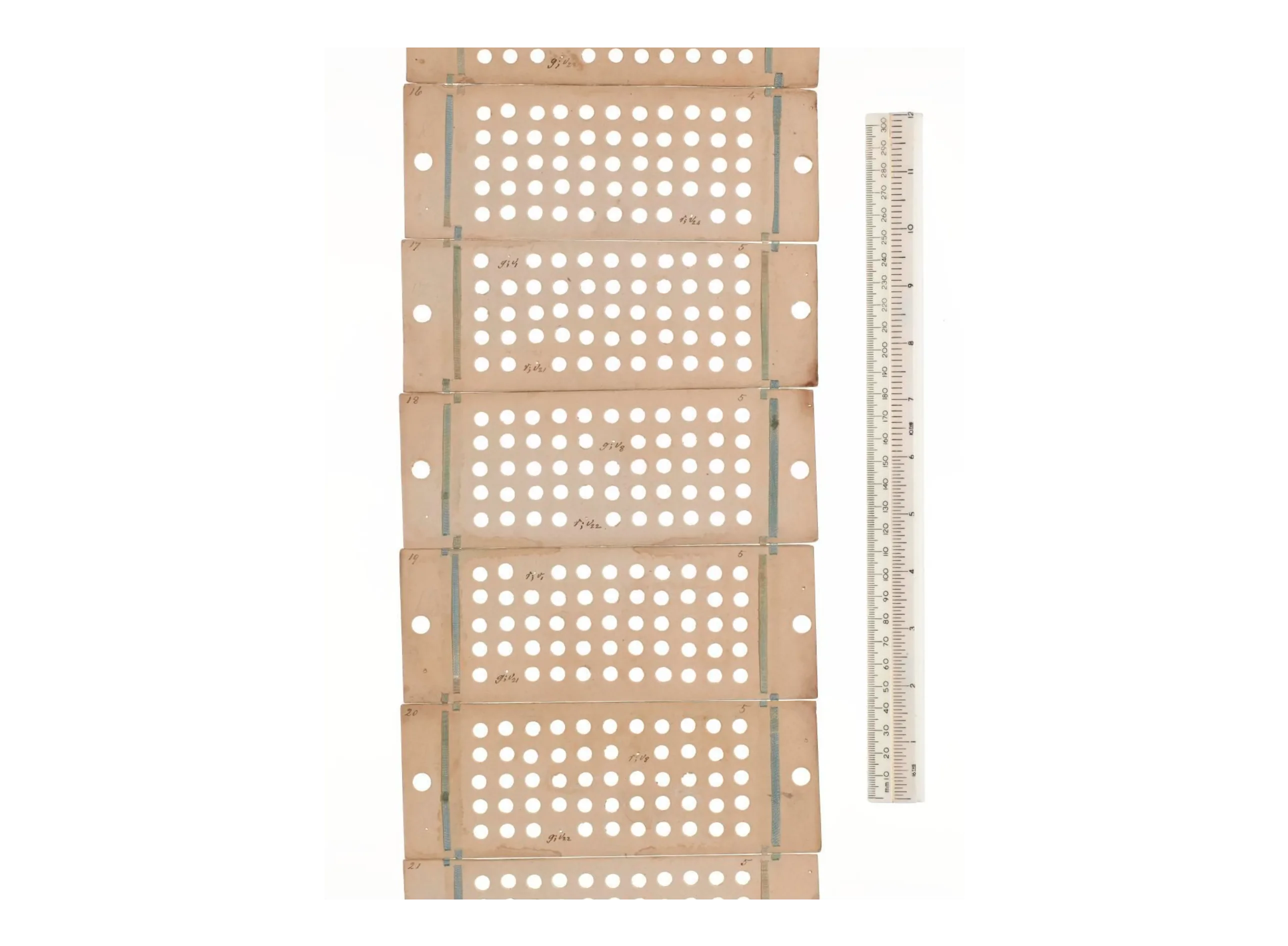 Punched cards used to encode operations and variables for Babbage's Analytical Engine